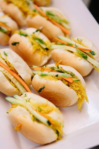 "Filipino Sliders" Spring noodles with chicken, in a Traditional Filipino Sweet Roll garnished with fresh cucumber and carrots.
